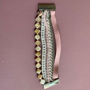 Victoria Emerson chained bracelet with magnetic band.